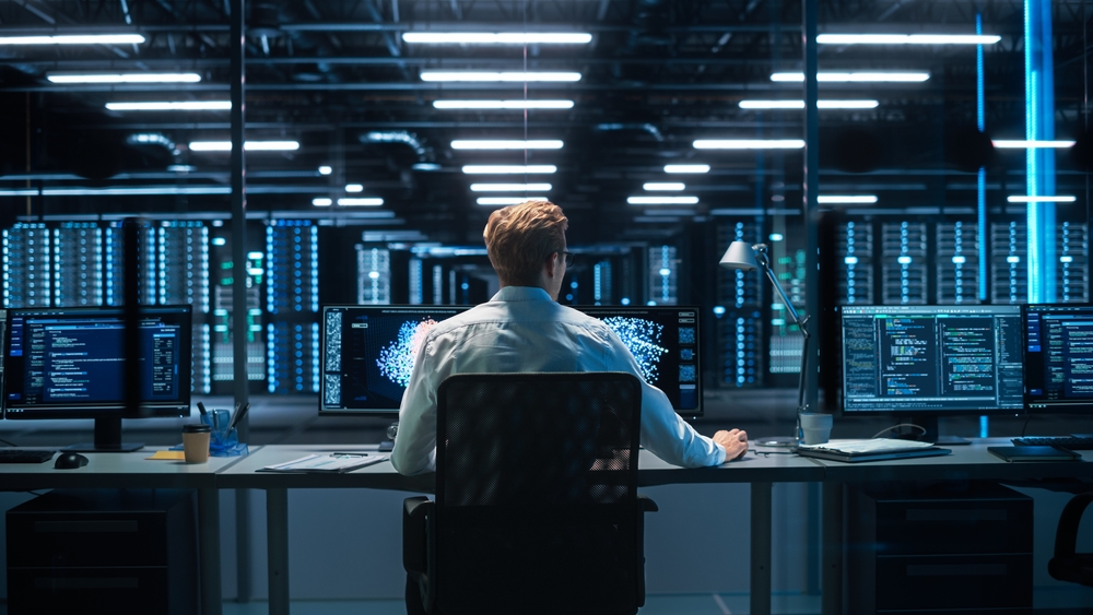 Back View Of The Male Computer Engineer And Scientist